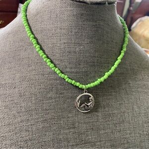 Green Beaded Necklace with Silver Tone Mermaid Pendant